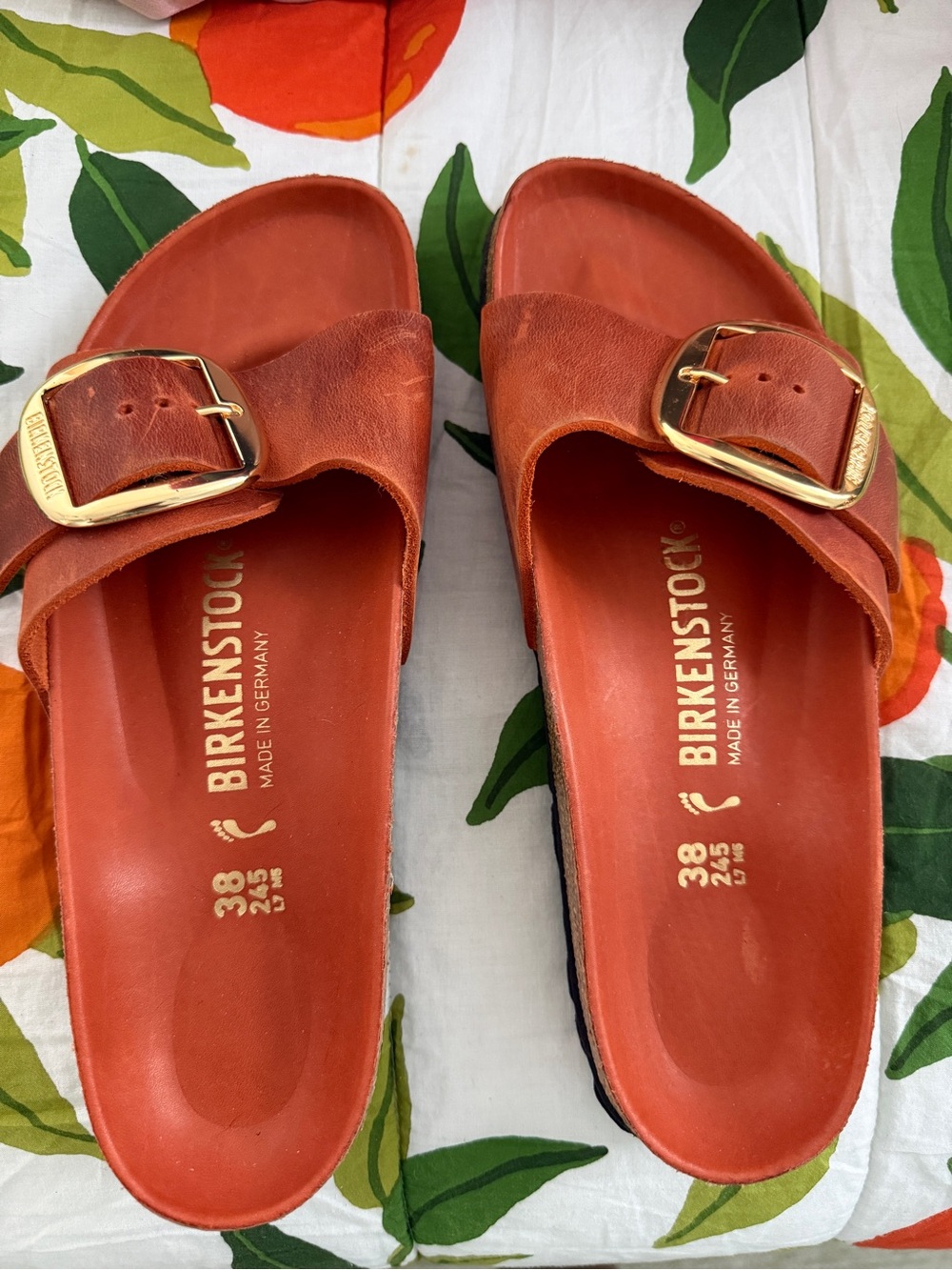 Birkenstock Single Strap Slide Sandals in Burnt Orange with Gold Buckles